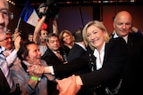 Marine Le Pen greets supporters in Paris