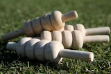 Four cricket bails are seen lying on the ground at the WACA ground in Perth.