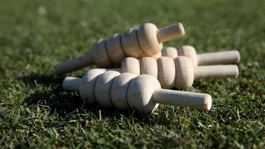 Four cricket bails are seen lying on the ground at the WACA ground in Perth.