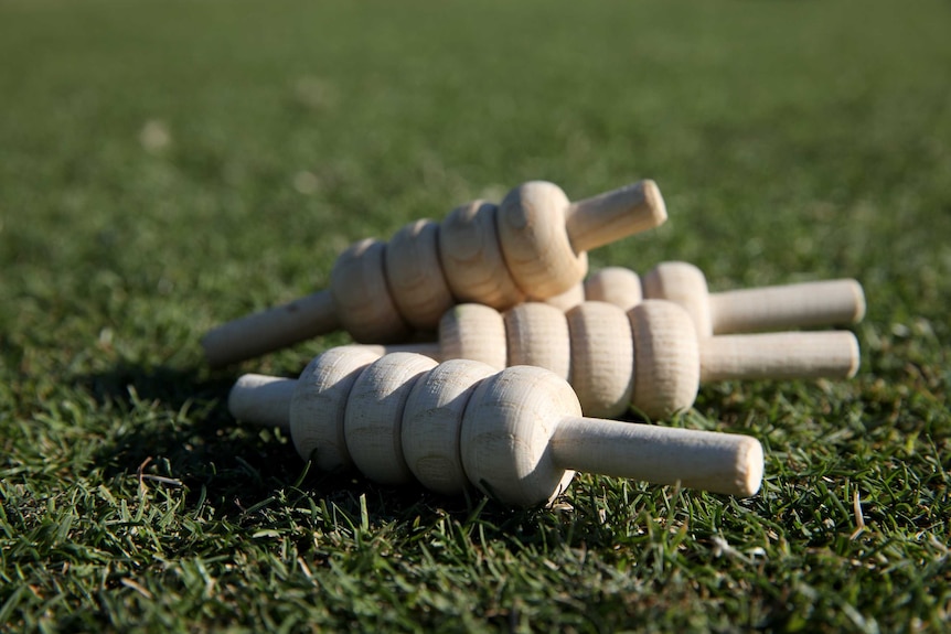 Four cricket bails are seen lying on the ground at the WACA ground in Perth.