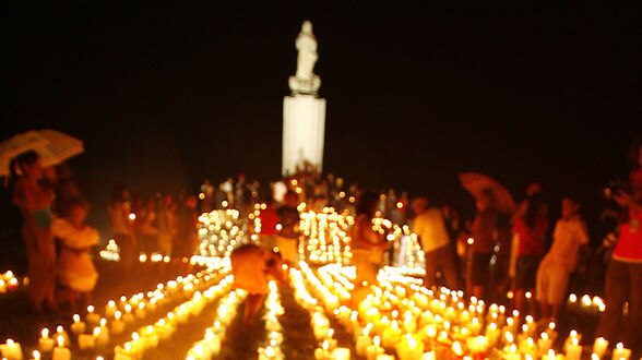 Dozens of people held a candlelit vigil in Dili