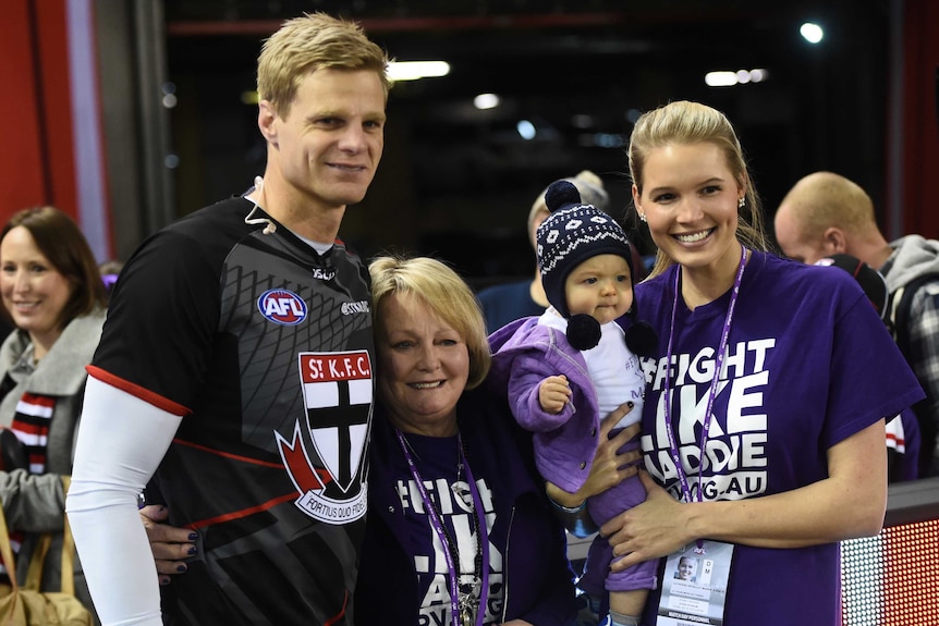 Nick Riewoldt with mother Fiona, son James and wife Catherine at Docklands