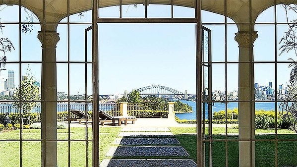A promotional image of the Ville del Mare property at Point Piper shows views of Sydney Harbour.