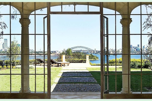 A promotional image of the Ville del Mare property at Point Piper shows views of Sydney Harbour.