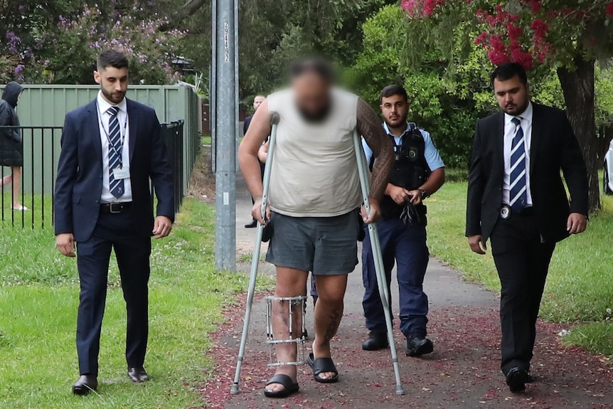 Cartwright man with injured leg, 26, arrested by NSW Police officers over murder plot against ONEFOUR members