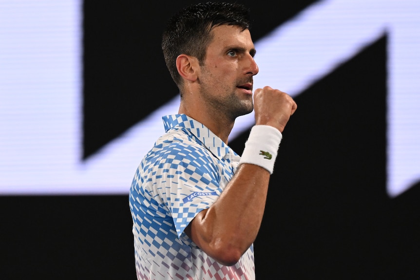 Novak Djokovic pumps his right fist during his Australian Open semifinal.
