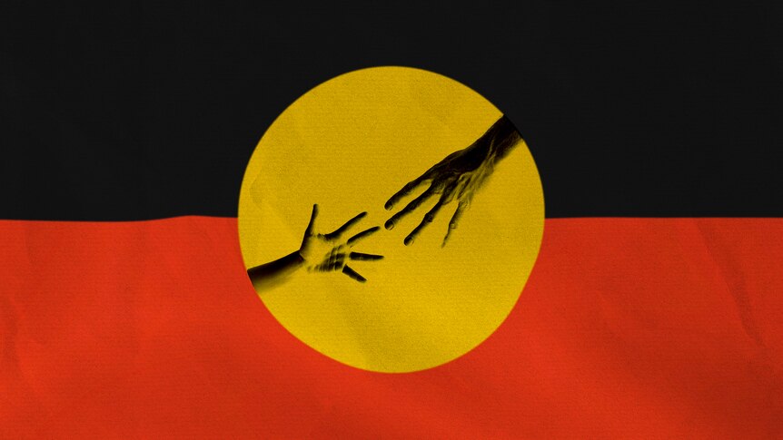 The Aboriginal flag with two hands reaching for each other in the yellow centre.