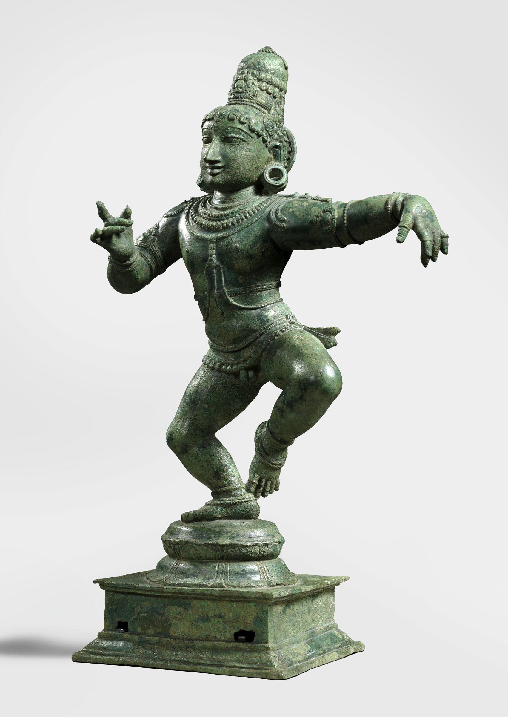 A statue of a child dancing. 