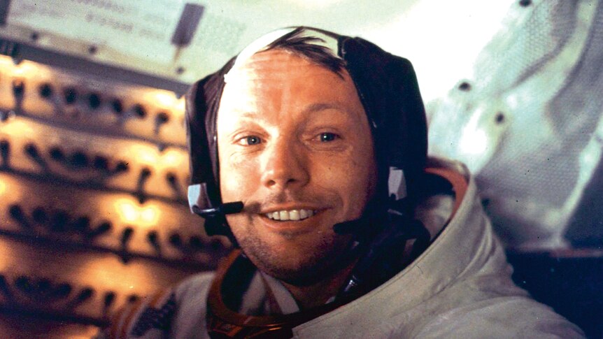 Apollo 11 space mission US astronaut Neil Armstrong smiles at the camera aboard the lunar module Eagle.