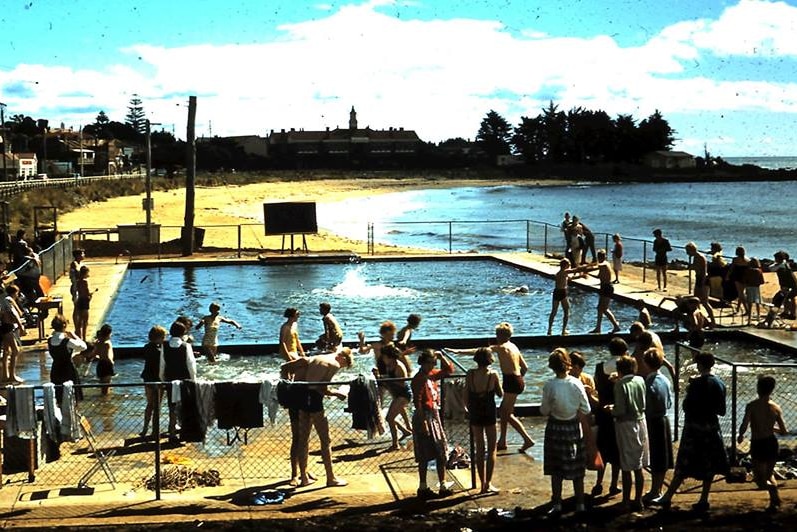 People milling about the Burnie beach pool.