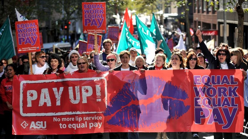 Sally McManus leads a rally