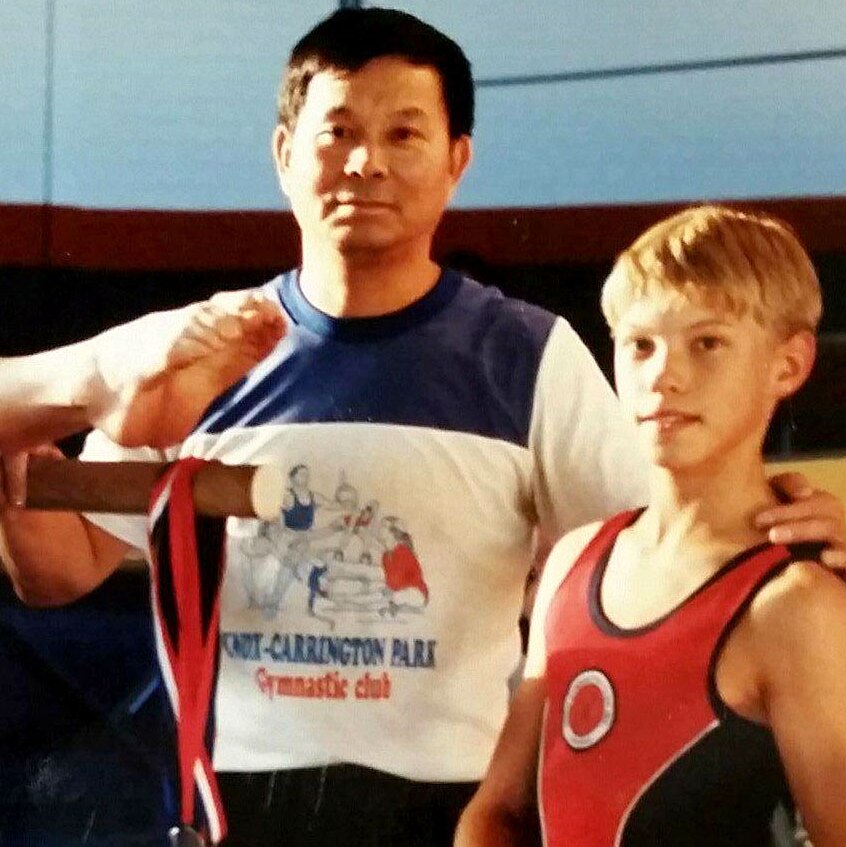 Peter Kismartoni (right) with his gymnastic coach Xu Yu Ting.