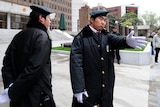 A security guard stands in front of Shanghai Number 1 Intermediate People's Court