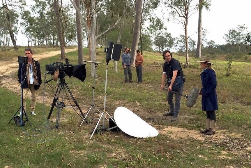 Camera and sound crew recording Pip Courtney introductions for program in bush setting.