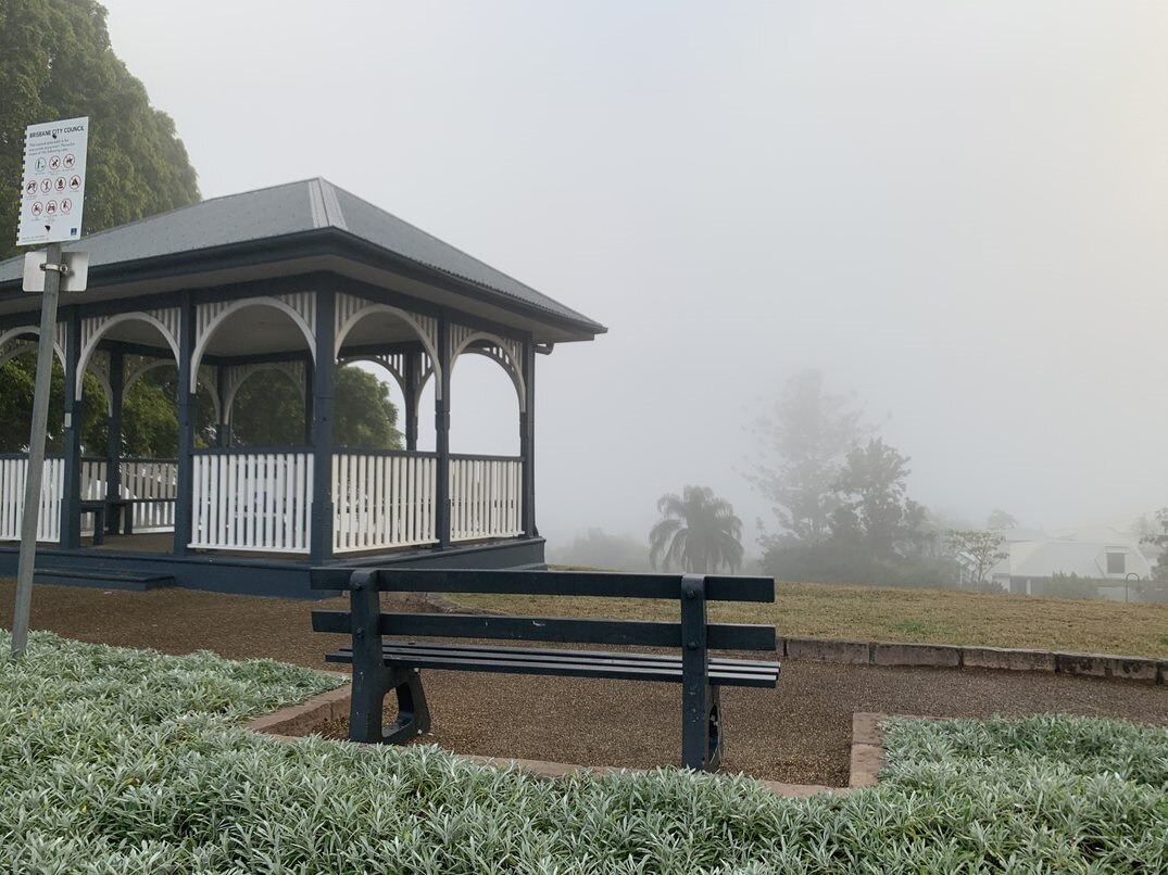 The city view lost in fog from Highgate Hill in Brisbane