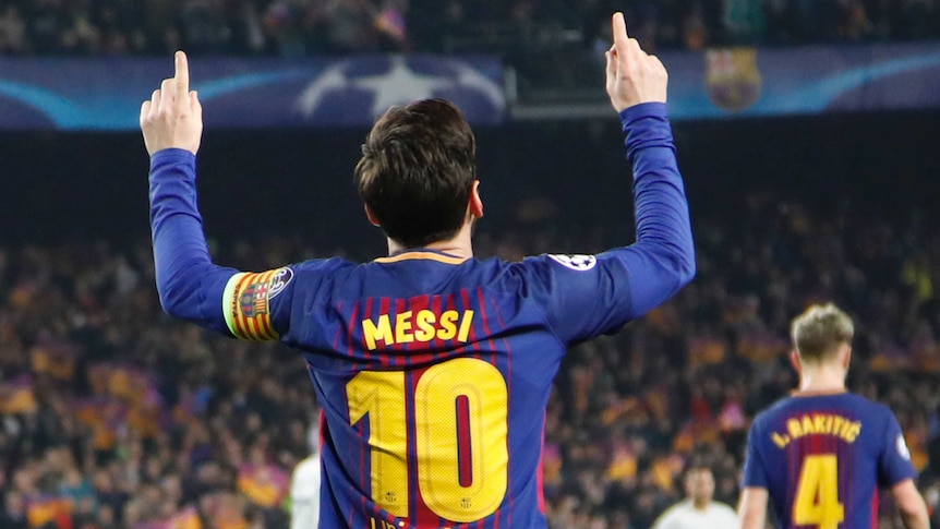 Lionel Messi celebrates after scoring Barcelona's third goal against Chelsea in the Champions League