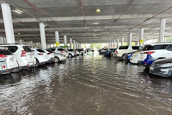 Cars in a flooded carpark