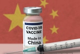 A graphic of a vaccine bottle and syringe against the backdrop of the Chinese flag.