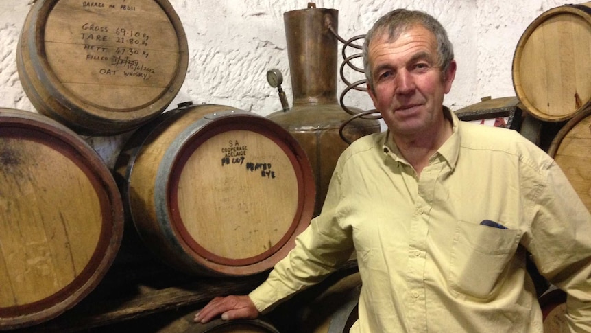 Peter Bignell standing in his whisky distillery in Kempton, southern Tasmania.