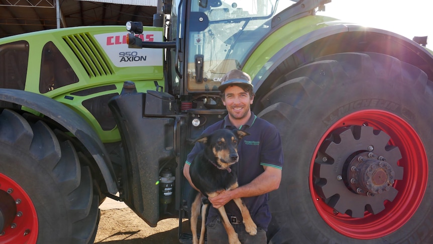 Reece Curwen holding dog