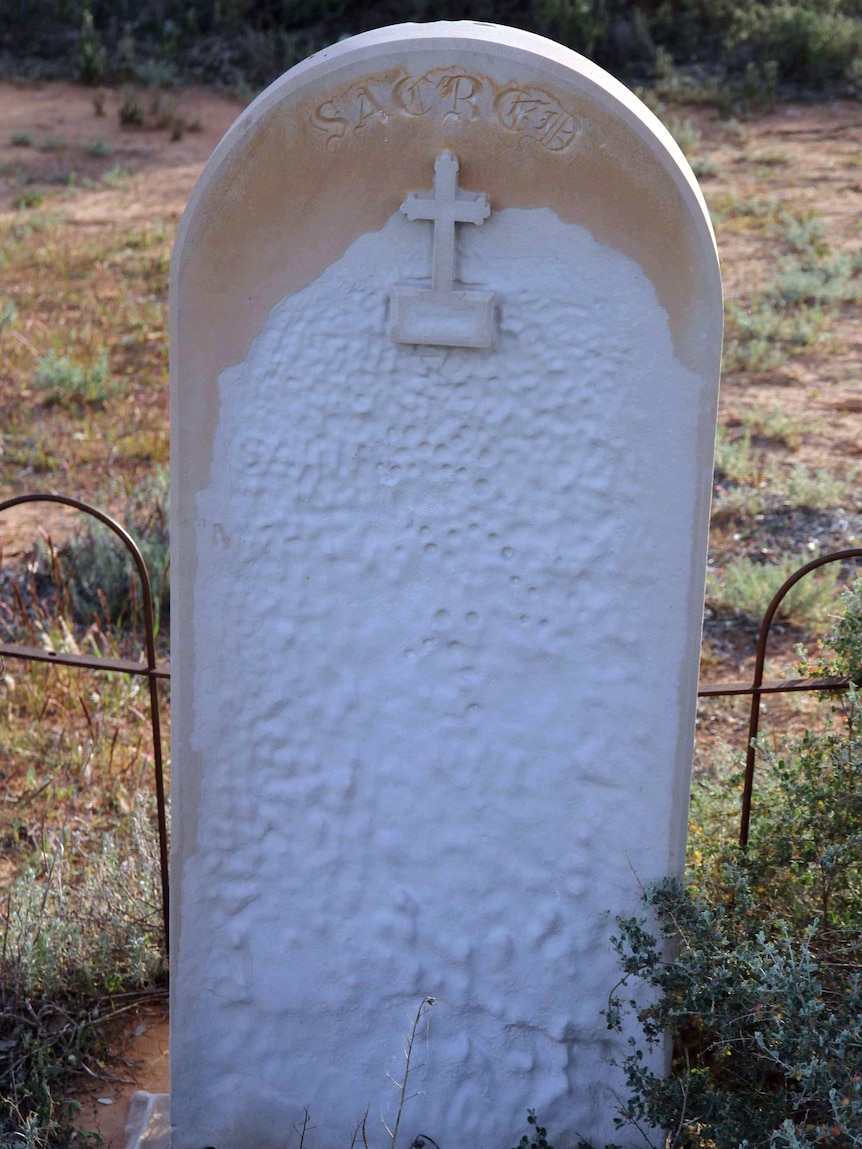 Inscription on a sandstone grave has been lost.