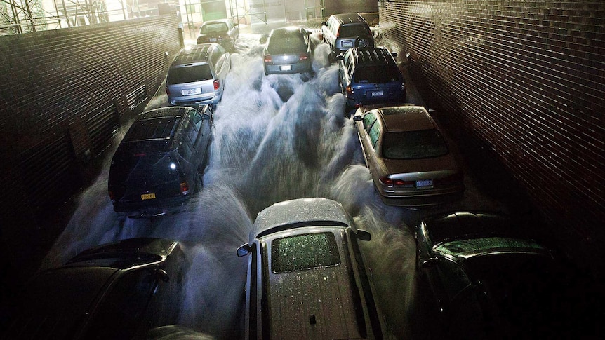 Floodwaters rush into NYC underground carpark during Sandy