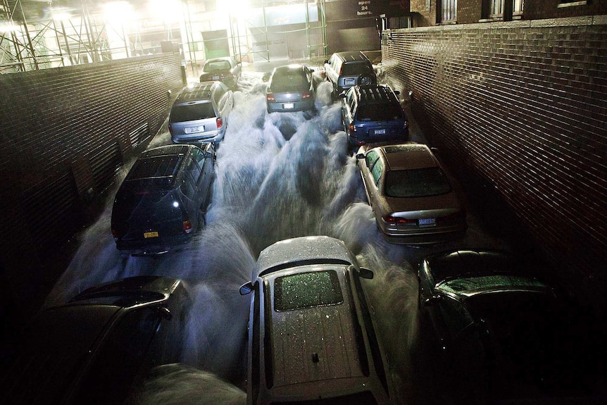 Floodwaters rush into NYC underground carpark during Sandy