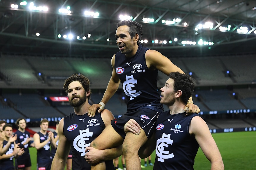 AFL great Eddie Betts is chaired off after his last game for Carlton, a loss to GWS.  