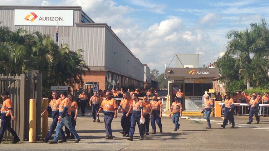 Aurizon workers outside rail freight and maintenance facility at Redbank, west of Brisbane on May 27, 2014.