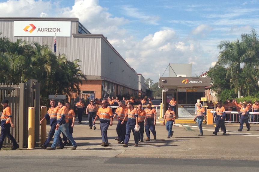 Aurizon workers outside rail freight and maintenance facility at Redbank, west of Brisbane on May 27, 2014.