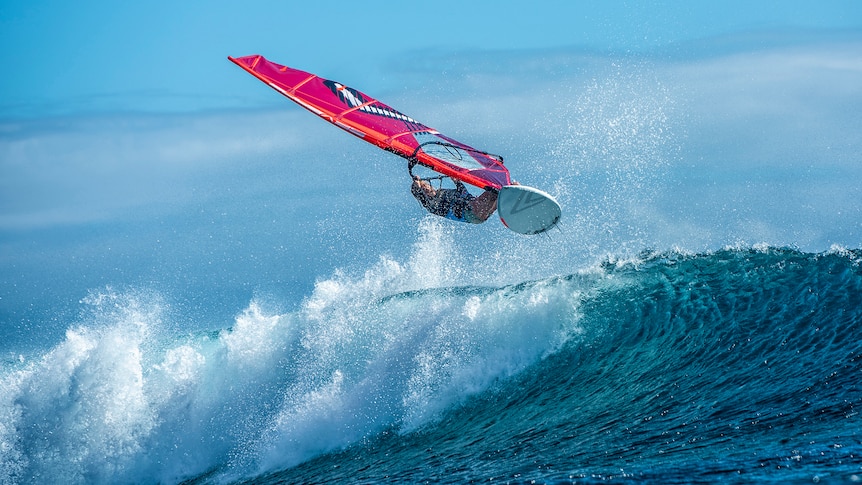 A windsurfer on a wave
