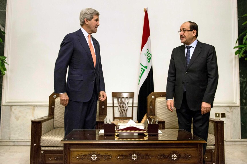 US secretary of state John Kerry (L) and Iraqi prime minister Nouri al-Maliki