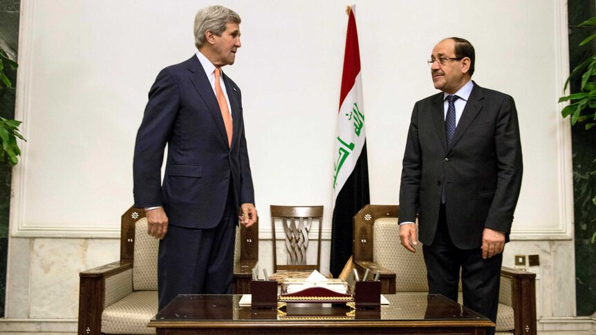 US secretary of state John Kerry (L) and Iraqi prime minister Nouri al-Maliki