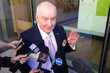 Alan Jones speaking to reporters outside court in Brisbane