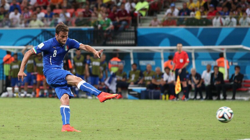 Italy's Claudio Marchisio scores the opening goal against England in Manaus