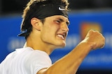 Bernard Tomic pumps his fist during the match against Alexandr Dolgopolov at the Australian Open on 20 January, 2012.