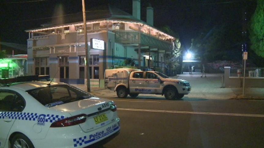 Police outside the Public House hotel at Petersham