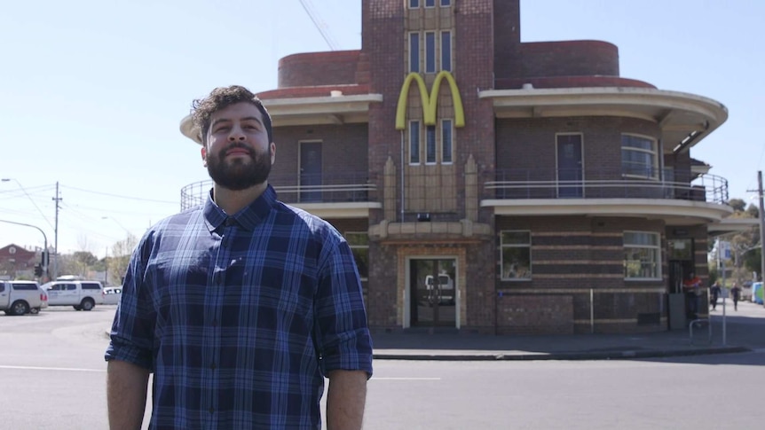 Nelio Da Silva standing outside the McDonald's he used to work at