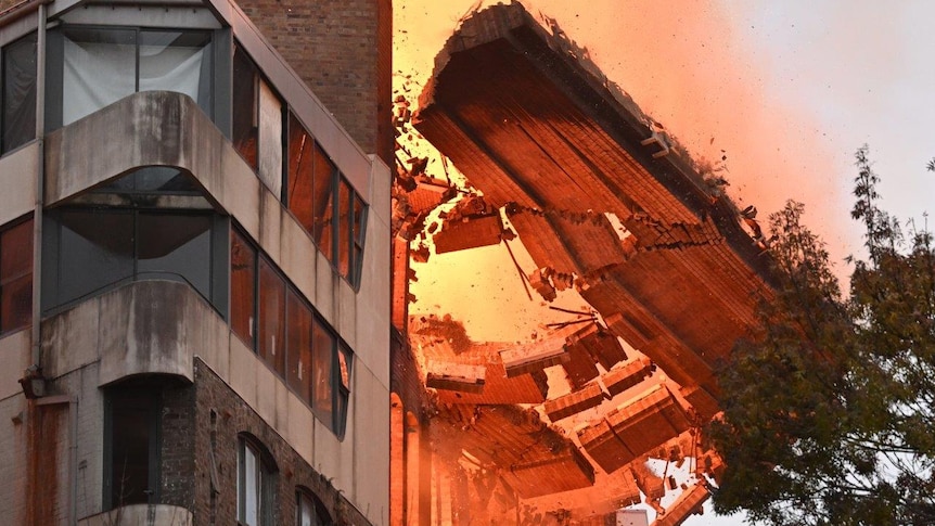 A wall collapses during a building fire in the Central Business District of Sydney.