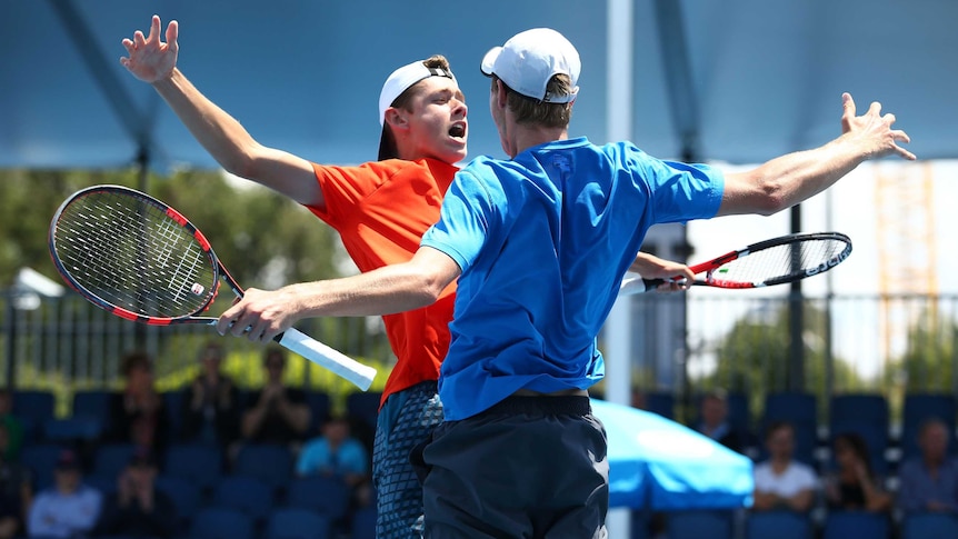 Alex De Minaur and Blake Ellis celebrate Australian Open boys doubles title