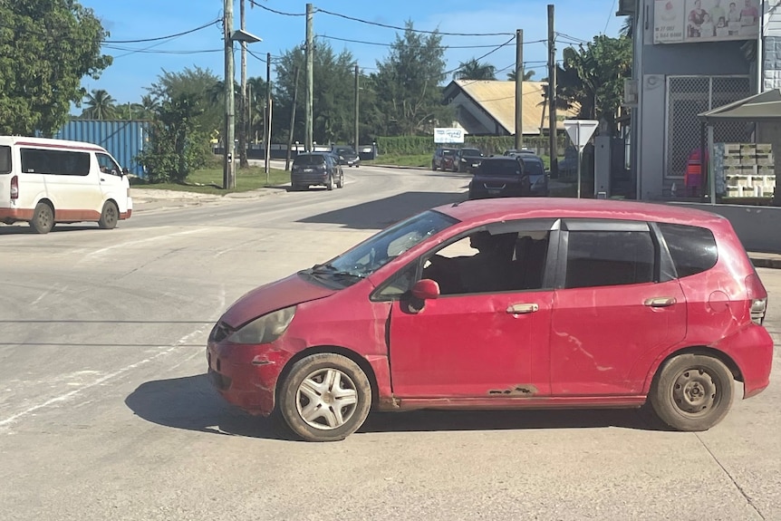 A rusty car in Tonga's capital city of Nuku'alofa