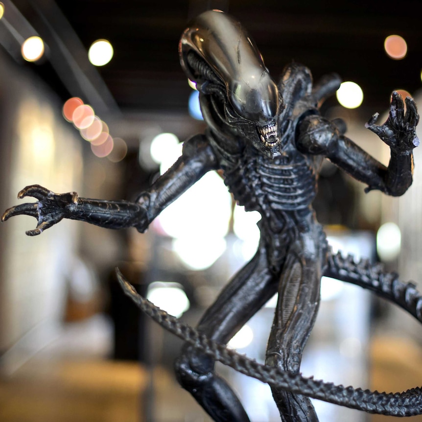 Sculpture of an Alien at the HR Giger Museum in Gruyeres, Switzerland.
