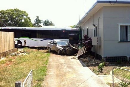 A bus protrudes from the side of a house at Redland Bay.