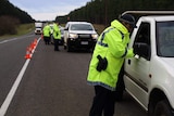 SA Police patrol a border checkpoint in South Australia