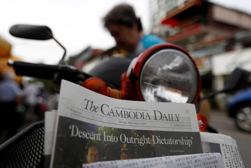 The final issue of The Cambodia Daily newspaper declared the country had descended "into outright dictatorship"