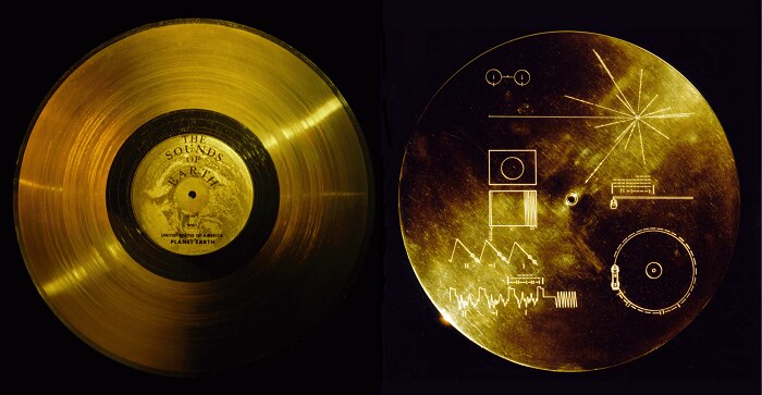 An image depicting two sides of a golden record. On one side it says The Sounds of Earth. On the other side are various diagrams