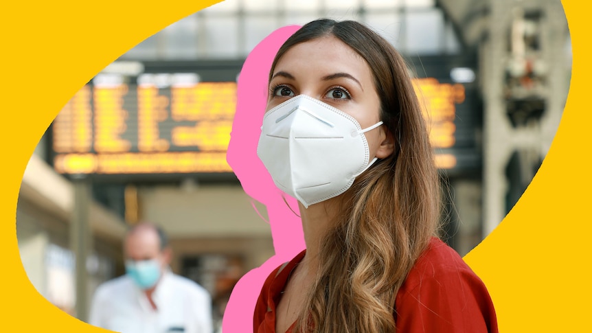 A woman in an N95 mask at an airport.