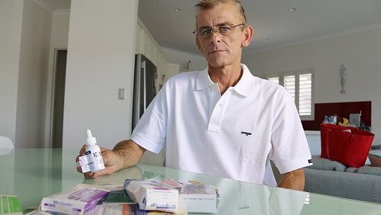 Man holds medication