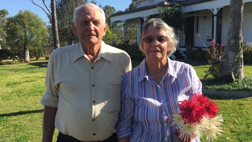 Wilf and Betty Jarret outside their home.