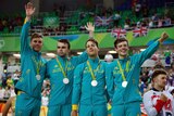 Australia's men's pursuit team with silver medals